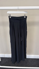 117 - SAMPLE SALE BLACK TROUSERS WITH SMALL HOLE AS SHOWN